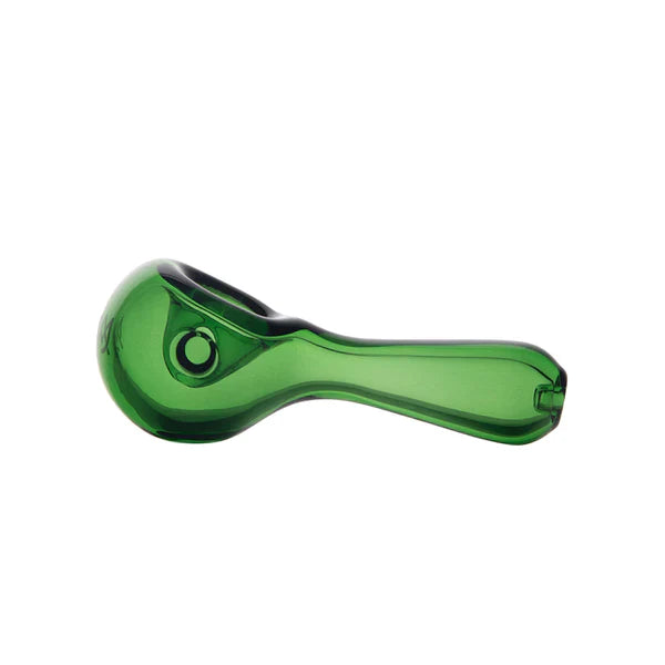 A person holding a small glass hand pipe filled with herb filtered by a pipe screen